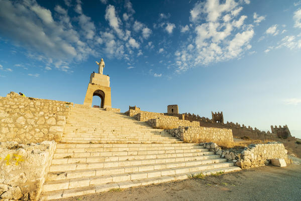 Jesus Christ Statue on San Cristobal Hill and Alcazaba Moorish fortress, Almeria, Andalusia, Spain