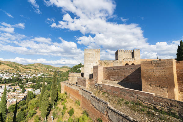 Defensive walls and towers of the Alcazaba old fortress, La Alhambra complex, Granada, Andalusia, Spain