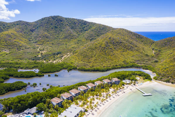 Aerial view of luxury resort on palm-fringed beach from above, Carlisle Bay, Antigua, Antigua and Barbuda, Caribbean, West Indies