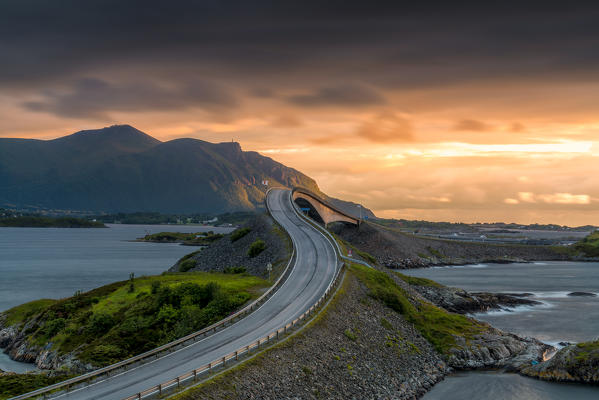 Sunset over the curves of Storseisundet Bridge along the Atlantic Road, More og Romsdal county, Norway