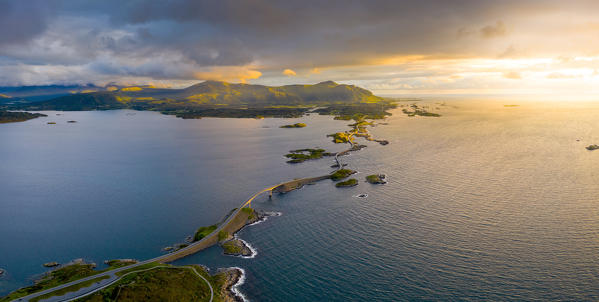 Aerial panoramic of sunset lights over Storseisundet Bridge, Atlantic Road, More og Romsdal county, Norway