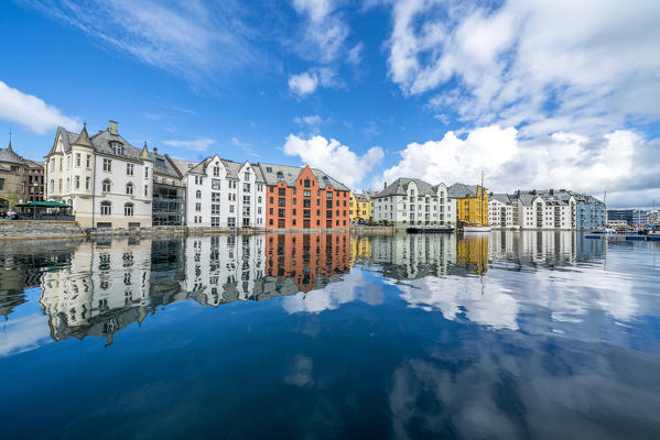 Art Nouveau styled houses mirrored in Brosundet canal, Alesund, More og Romsdal county, Norway
