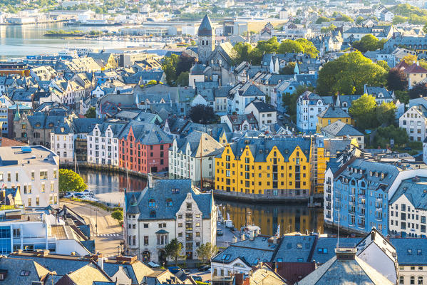 Sunset over Brosundet Canal and Art Nouveau buildings, Alesund, More og Romsdal county, Norway