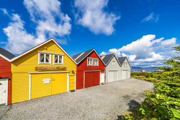 Colorful wood houses in a row, Alnes, Godoya Island, Alesund, More og Romsdal County, Norway