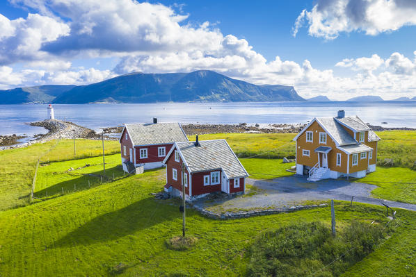 Aerial view of traditional houses and Hogsteinen Lighthouse, Godoya Island, Alesund, More og Romsdal County, Norway
