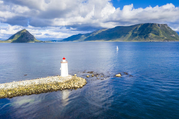 Aerial view of Hogsteinen Lighthouse overlooking the blue sea, Godoya Island, Alesund, More og Romsdal County, Norway