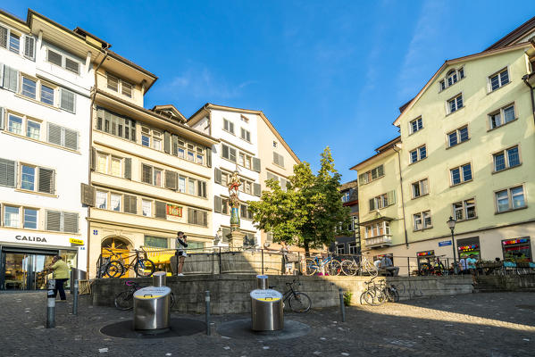 Tourists in a pedestrian square of the Lindenhof area, Old Town of Zurich, Switzerland