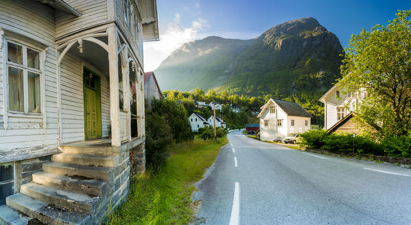 Panoramic of road along Hjelle village with mountains in background, Oppstryn, Sogn og Fjordane county, Norway