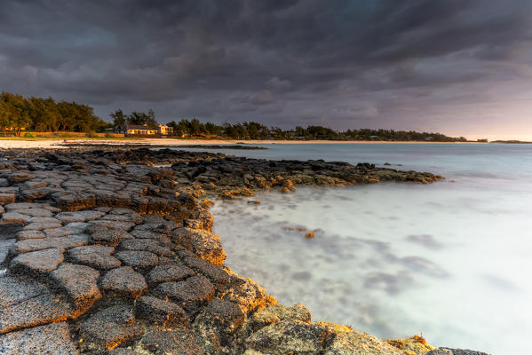 Storm clouds at sunrise over Trou d'Eau Douce, Flacq district, Indian Ocean, East coast, Mauritius