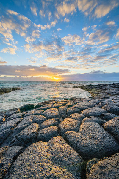 Light of sunrise reflected in the Indian Ocean, Trou d'Eau Douce, Flacq district, East coast, Mauritius