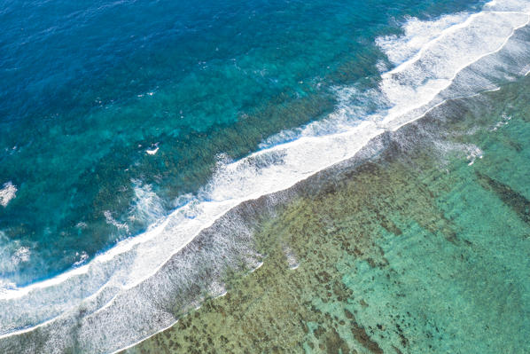 Waves of Indian Ocean crashing over the coral reef from above, Trou d'Eau Douce, Flacq district, East coast, Mauritius