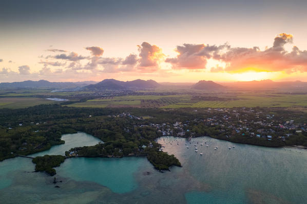 African sunset over lush vegetation and turquoise lagoon, aerial view, Trou d'Eau Douce, Flacq, Indian Ocean, East coast, Mauritius