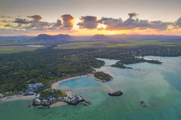 Sunset over luxury resort in the turquoise lagoon, aerial view, Trou d'Eau Douce, Flacq, Indian Ocean, East coast, Mauritius