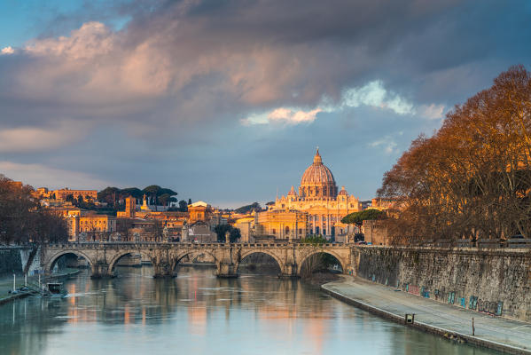 River Tiber and St. Peter's Basilica (Basilica di San Pietro) at sunrise, Rome, Lazio, Italy