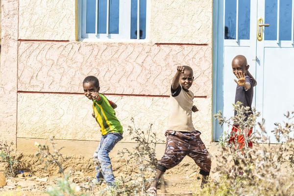 Three little boys playing happily, Abala, Afar Region, Ethiopia, Africa