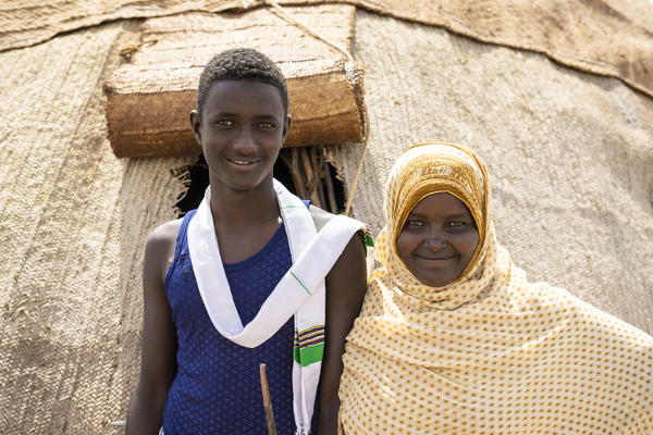 Young man with woman wearing the muslim traditional hijab, Asaita, Afar Region, Ethiopia, Africa