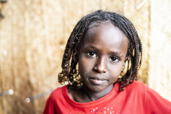 Cute little girl with braids, Melabday, Asso Bhole, Danakil Depression, Afar Region, Ethiopia, Africa