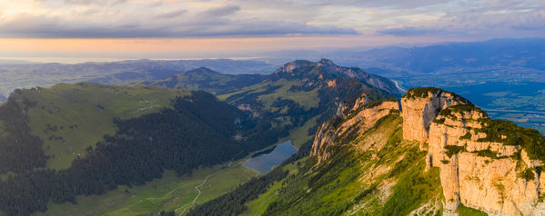 Sunset over Samtisersee lake, Staubern and Hoher Kasten mountains, aerial view, Appenzell Canton, Alpstein Range, Switzerland