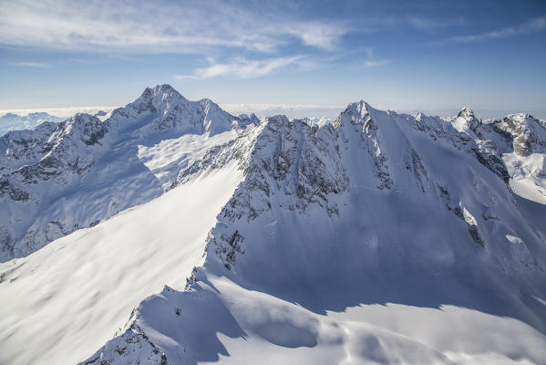 Aerial view of Cima di Vezzeda, Cima di Rosso and Mount Disgrazia. Forno valley, Engadine, Canton Grigioni, Switzerland.