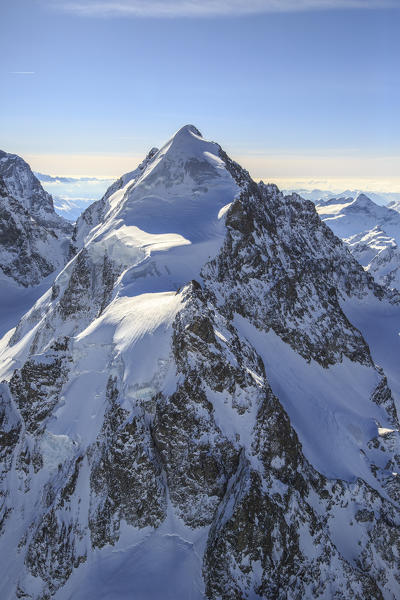 Aerial picture of the north side of Piz Roseg in winter. Val Roseg, Engadine, Canton Grigioni, Switzerland.