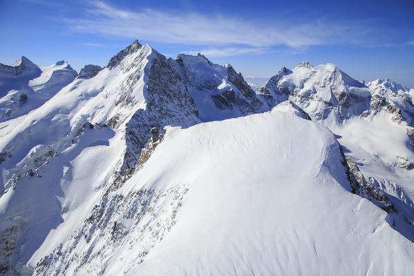 Air view of Piz Bernina with Piz Morterasch in close-up. Engadine, Canton Grigioni, switzerland.