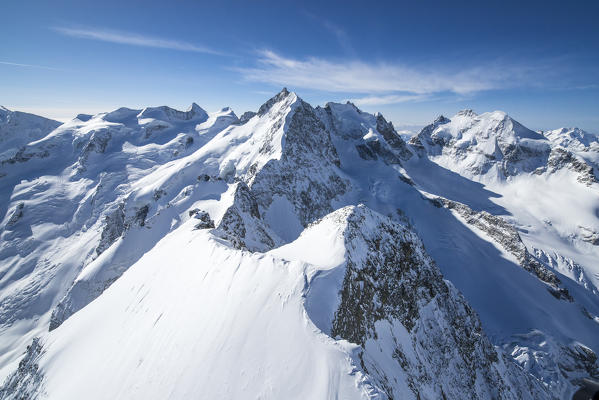 Air pictureof Pizzo Bernina and Piz Morterasch in winter. Engadine, Canton Grigioni, Switzerland.