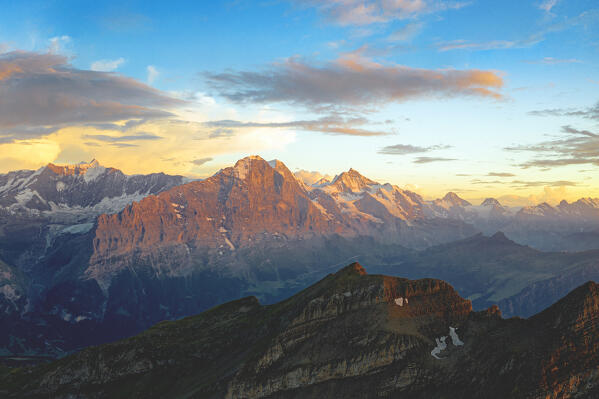 Aerial panoramic of Eiger, Monch and Jungfrau mountains at sunset, Grindelwald, Bernese Oberland, Bern Canton, Switzerland