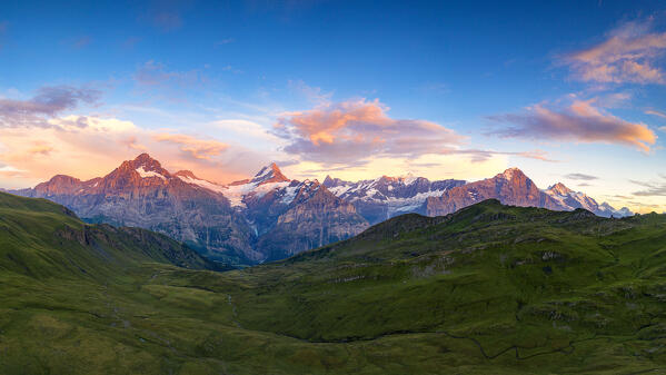 Aerial view of Wetterhorn, Schreckhorn, Finsteraarhorn, Eiger and Jungfrau mountains at sunset, Grindelwald, Bern, Switzerland