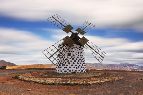 Molinos de Villaverde windmill in the volcanic landscape, La Oliva, Fuerteventura, Canary Islands, Spain