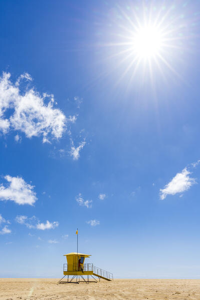 Lifeguard's cabin hit by sun rays on fine sand beach, Morro Jable, Fuerteventura, Canary Islands, Spain