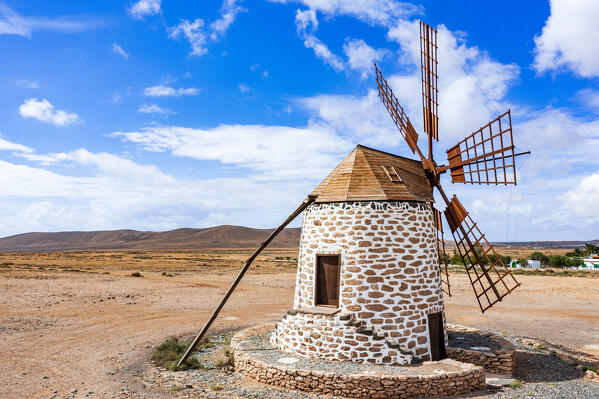 Clear sky over the old windmill made of stone and wood, Tefia, Fuerteventura, Canary Islands, Spain