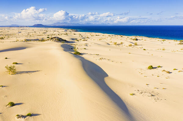 Sand dunes in the empty desert landscape, Corralejo Nature Park, Fuerteventura, Canary Islands, Spain