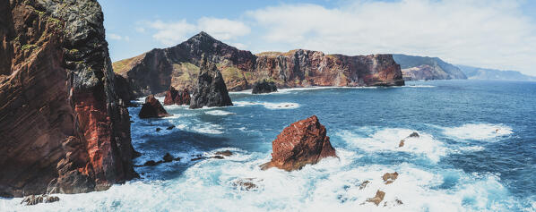 Waves crashing on volcanic rocks of cliffs, Sao Lourenco Peninsula, Canical, Madeira island, Portugal