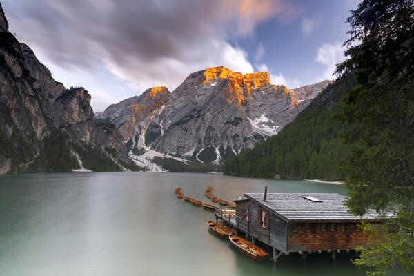 Lake Braies / Pragser Wildsee at sunset with Croda del Becco mountain on background, Dolomites, South Tyrol, Italy