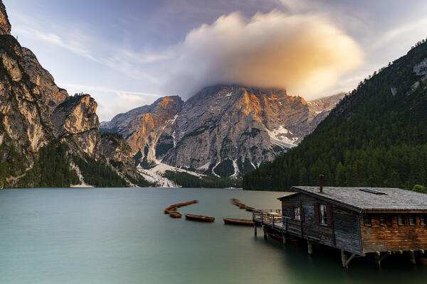 Sunset over lake Braies (Pragser Wildsee) and majestic Croda del Becco mountain, Dolomites, South Tyrol, Italy