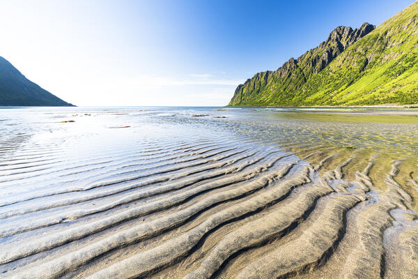 Sunny day over Ersfjord beach and mountains in summer, Senja, Troms county, Norway