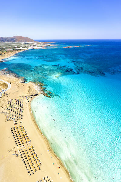 Aerial view of the equipped beach of Falassarna washed by the turquoise sea, Kissamos, Chania, Crete island, Greece