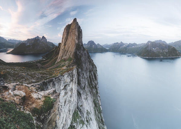 Dramatic sky at sunrise over the tall rocks of Segla mountain, Senja island, Troms county, Norway