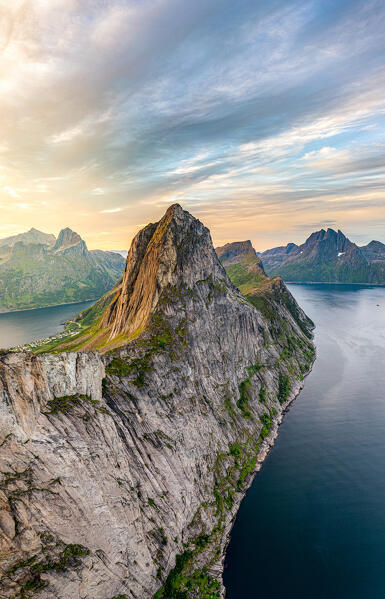 Cloudy sky at dawn over the steep ridge of mount Segla, Senja island, Troms county, Norway