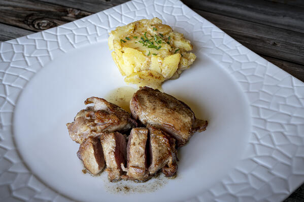 Sliced pork fillet with roasted potatoes, Italy