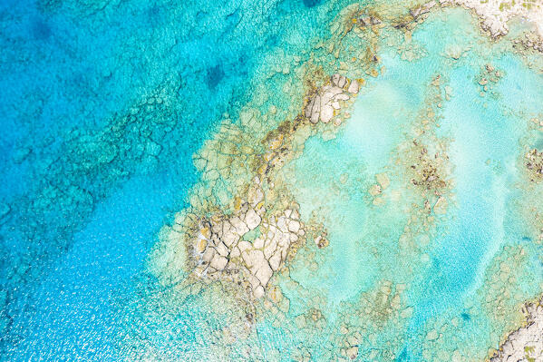 Cliffs in the turquoise colored sea from above, aerial view, Crete island, Greece
