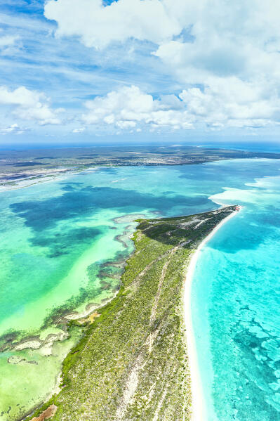 Aerial view of lagoon and turquoise sea with long stretch white sand beach in between, Barbuda, Antigua & Barbuda, Caribbean