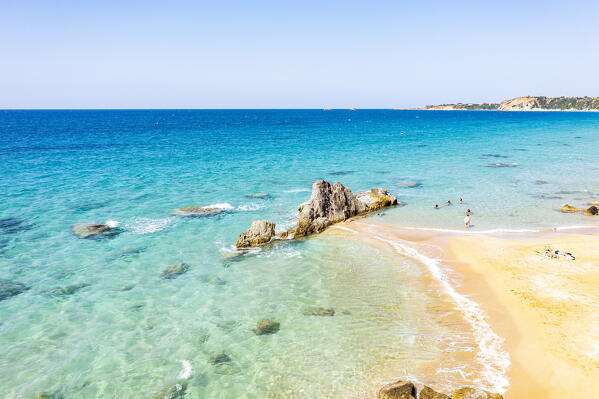 Aerial view of tourists enjoying swimming in the turquoise sea, Paliolinos beach, Kefalonia, Ionian Islands, Greece