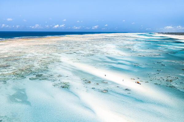 Overhead view of a blue lagoon on white coral sand, Pingwe, Michamvi, Zanzibar, Tanzania