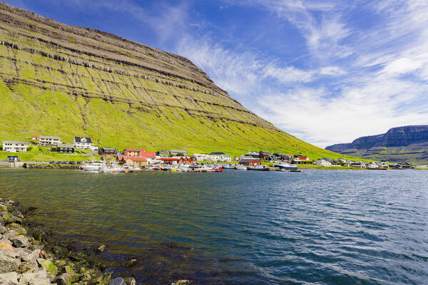 Fishing village of of Hvannasund surrounded by mountains in summer, Bordoy island, Faroe Islands, Denmark