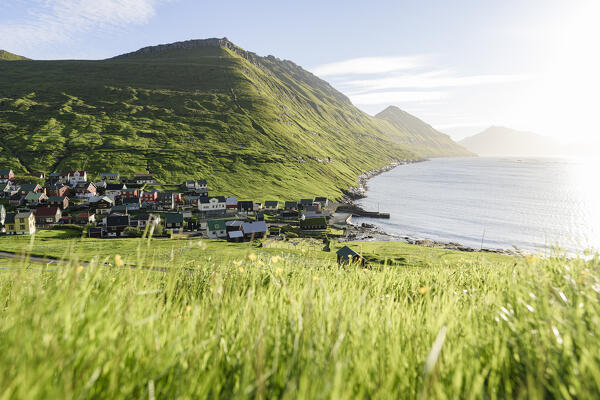 Sunrise over the fishing village of Funningur in summer, Eysturoy Island, Faroe Islands