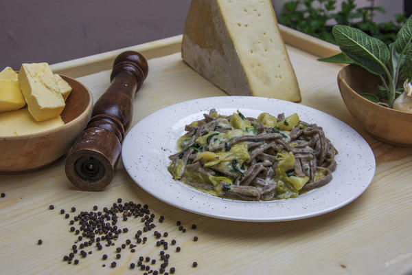 The Pizzoccheri are the first main course of Valtellina cuisine. Lombardy. Italy. Europe