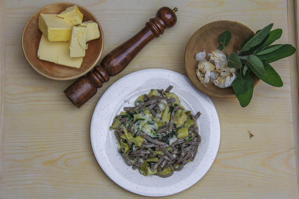 Pizzoccheri plate ready to be eaten. Lombardy. Italy. Europe