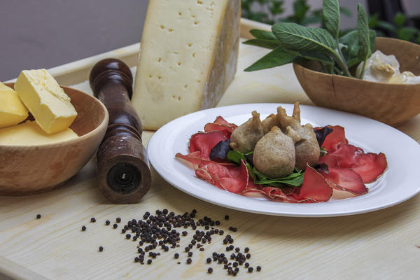 Valtellina typical dish consisting in Sciatt with bresaola. Lombardy. Italy. Europe