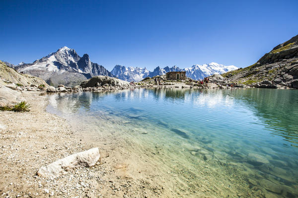 The Mont Blanc mountain range reflected in the waters of Lac Blanc. Haute Savoie France